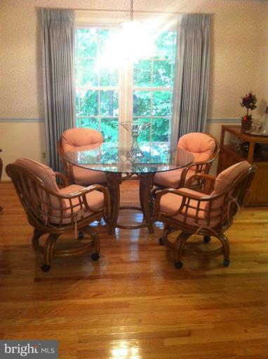 7709 Tower Woods Drive Springfield, VA 22153 - Photo 7 of 15 a living room with furniture and a large window