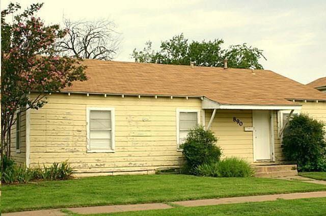 1602 South 9th Street Abilene, TX 79602 - Photo 1 of 9 a view of a house with a yard and plants