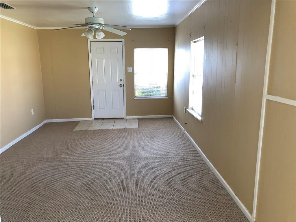 1602 South 9th Street Abilene, TX 79602 - Photo 3 of 9 an empty room with windows and closet