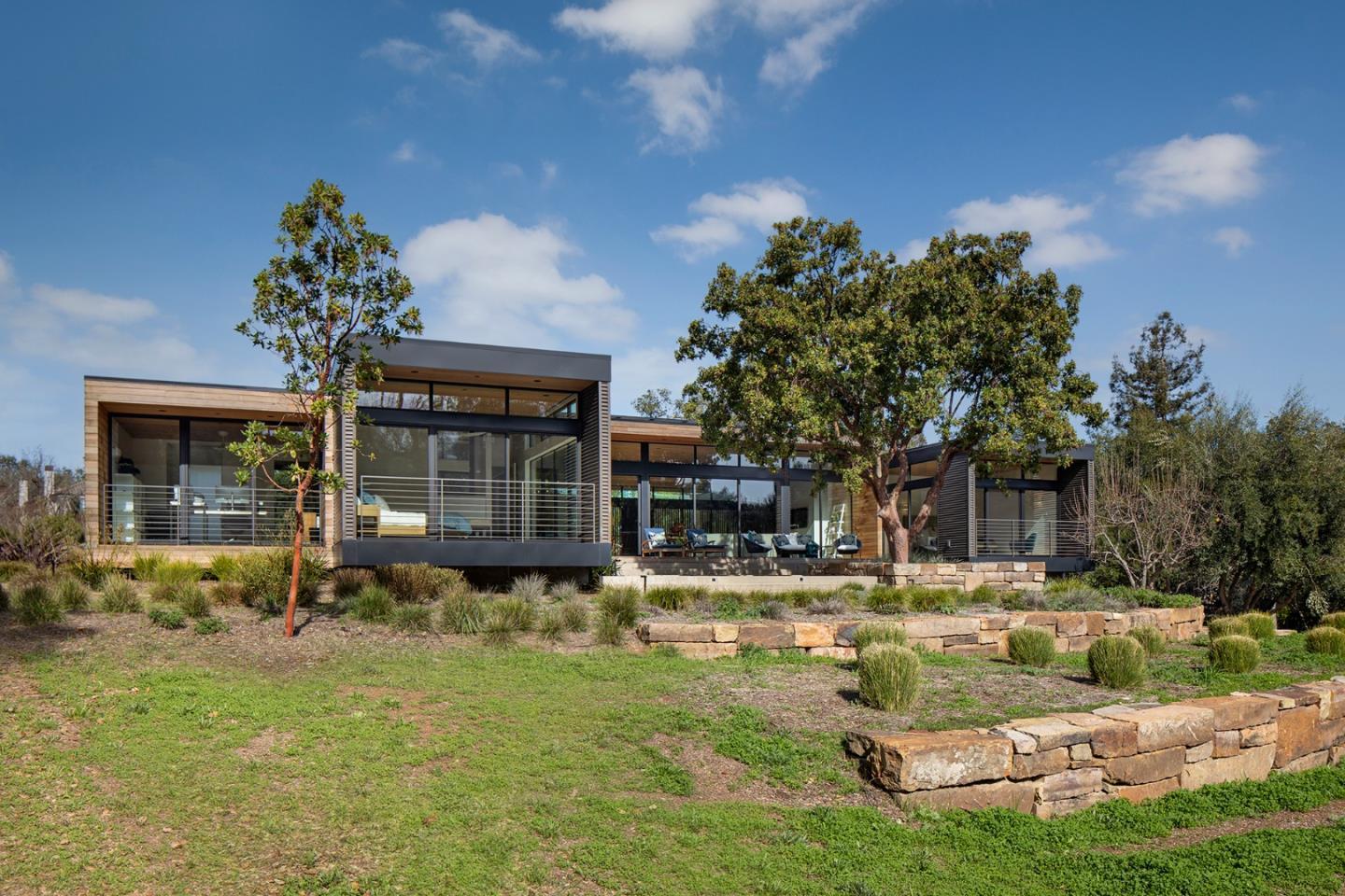 93 Broadacres Road Atherton, CA 94027 - Photo 13 of 18 a front view of a house with garden