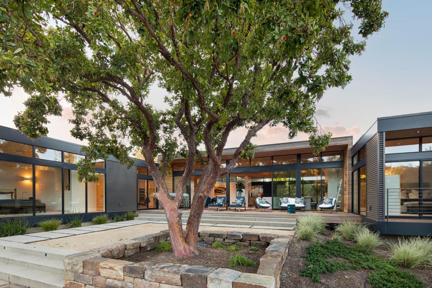 93 Broadacres Road Atherton, CA 94027 - Photo 3 of 18 a front view of a building with trees