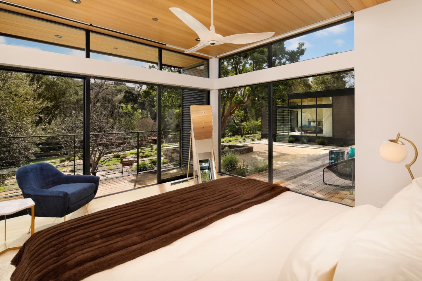 93 Broadacres Road Atherton, CA 94027 - Photo 7 of 18 a building outdoor space with patio furniture and potted plants