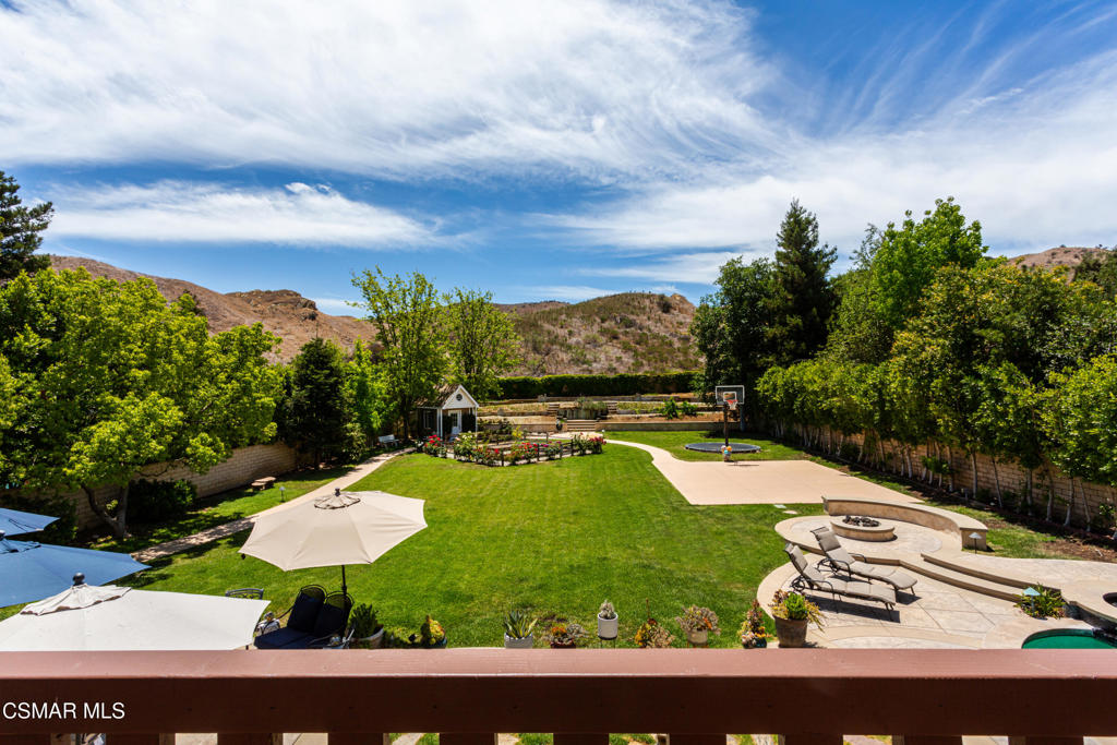68 Twisted Oak Drive Simi Valley, CA 93065 - Photo 1 of 23 a view of a swimming pool with a yard
