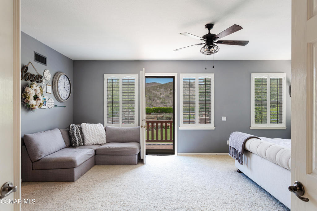 68 Twisted Oak Drive Simi Valley, CA 93065 - Photo 12 of 23 a living room with furniture and a large window