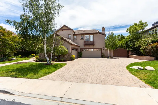 a house view with a outdoor space