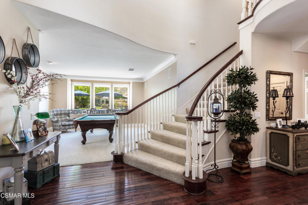 68 Twisted Oak Drive Simi Valley, CA 93065 - Photo 3 of 23 a living room with furniture a fireplace and a potted plant