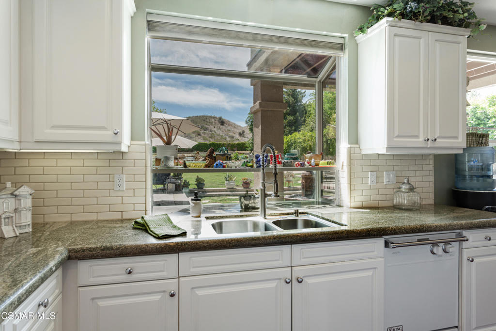 68 Twisted Oak Drive Simi Valley, CA 93065 - Photo 5 of 23 a kitchen with a sink and a window