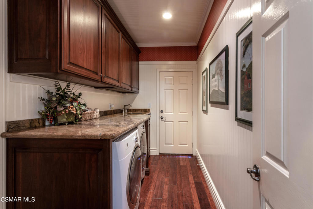 68 Twisted Oak Drive Simi Valley, CA 93065 - Photo 10 of 23 a kitchen with stainless steel appliances granite countertop a sink stove and cabinets