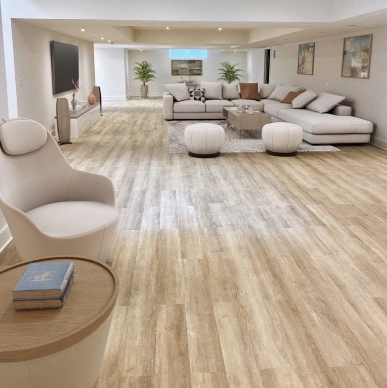 5 Radcliffe Road Weston, MA 02493 - Photo 27 of 41 a living room with furniture and a wooden floor