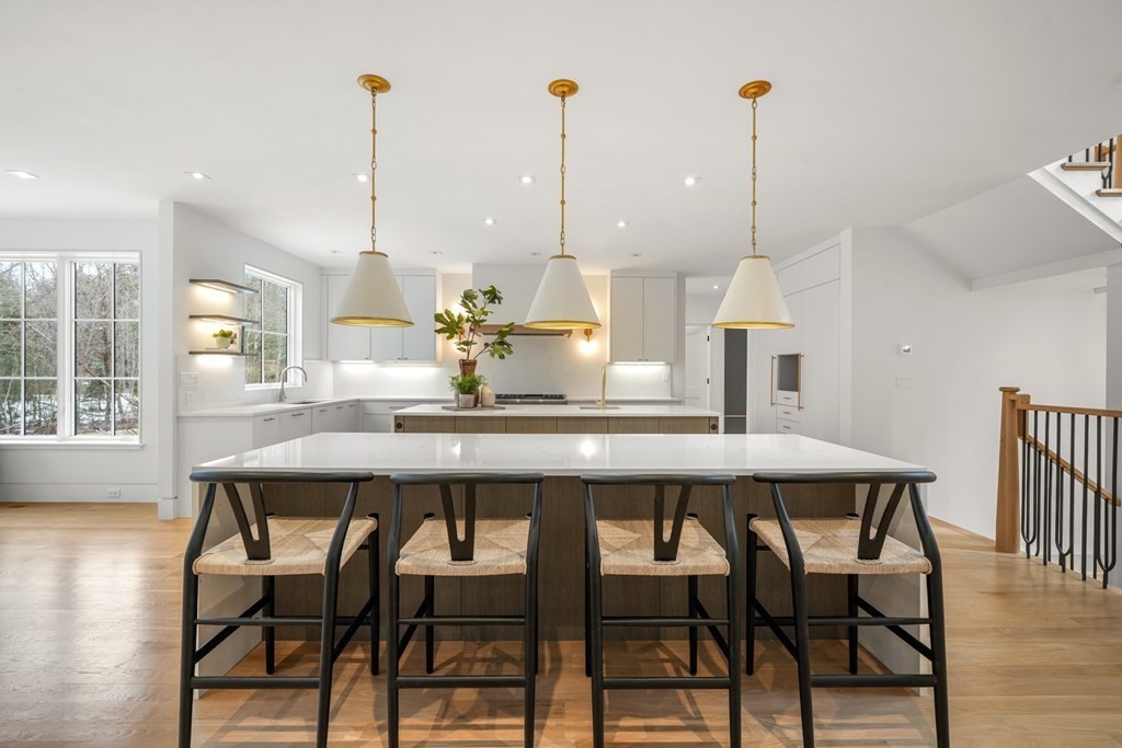5 Radcliffe Road Weston, MA 02493 - Photo 7 of 41 a dining room with furniture and wooden floor