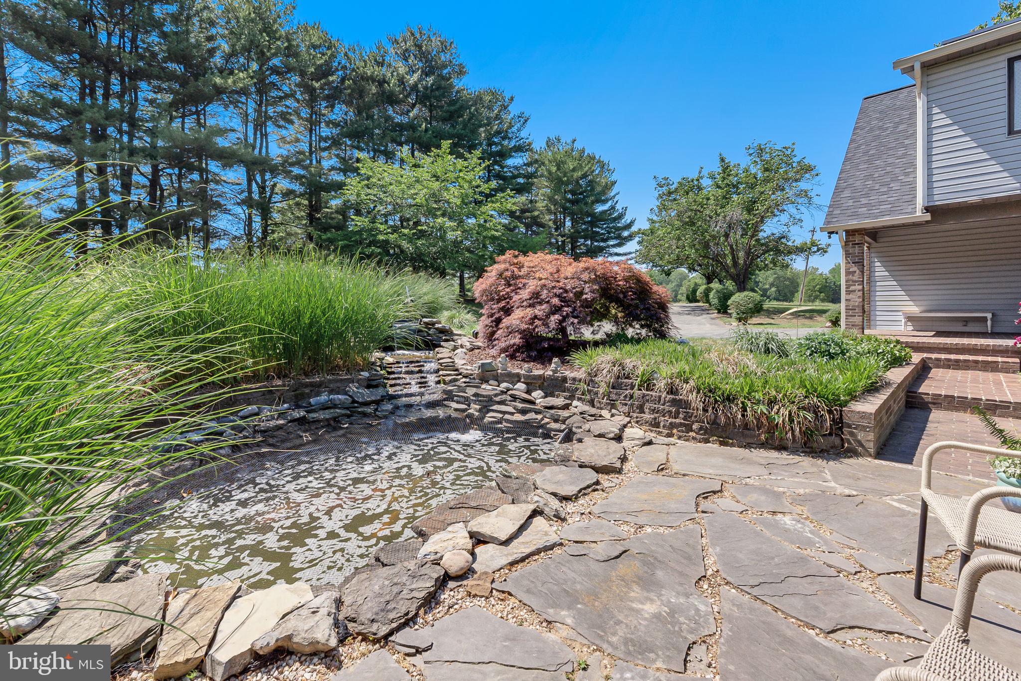 1800 Holland Cliffs Road Huntingtown, MD 20639 - Photo 51 of 70 Koi pond