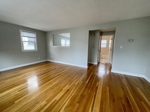 59 Desoto Road, Unit 2 Boston, MA 02132 - Photo 2 of 13 a view of wooden floor in a room