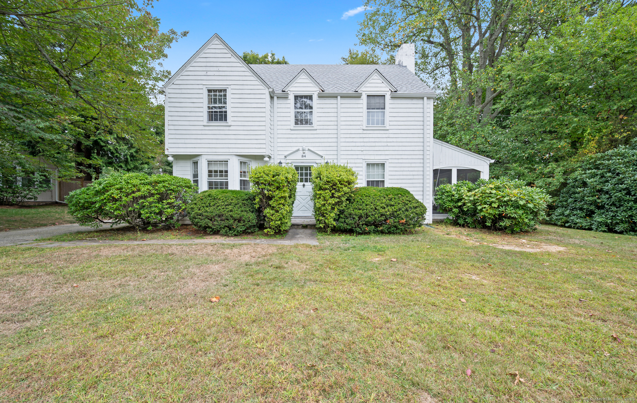 84 Applegate Road Fairfield, CT 06825 - Photo 1 of 1 a view of a house with a yard and plants