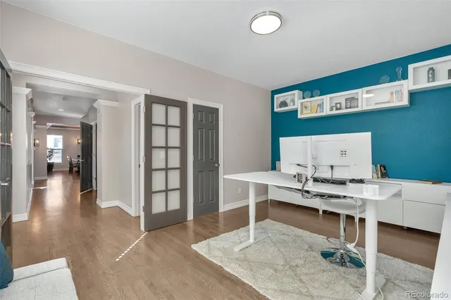 a workspace with furniture and window