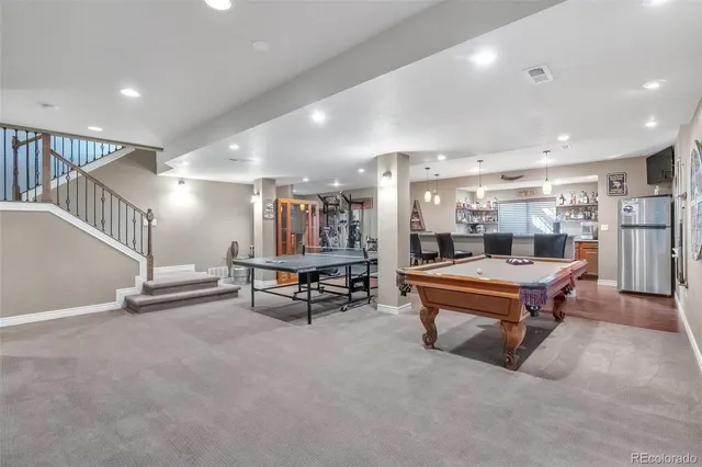 a room with pool table table tennis table
