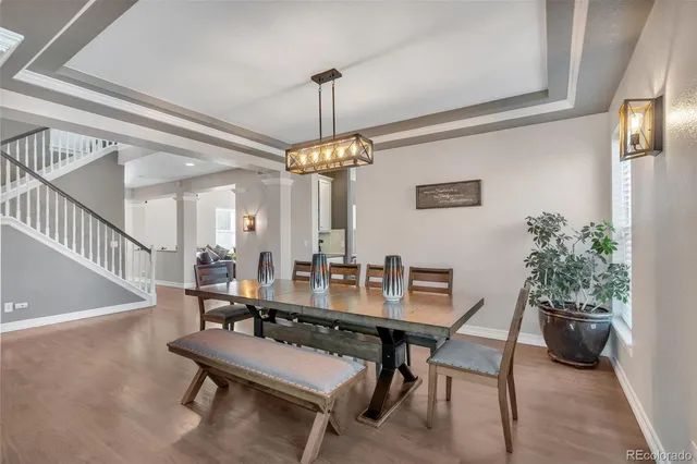 a view of a workspace and dining room