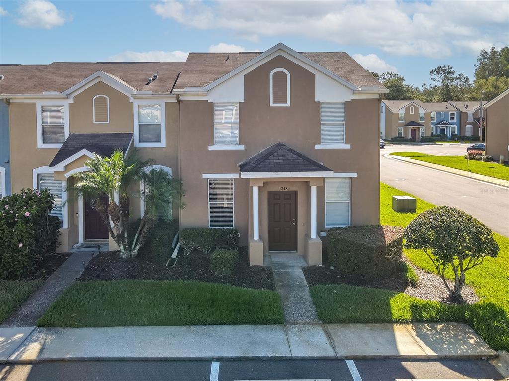 1238 Beckenham Way Wesley Chapel, FL 33543 - Photo 1 of 1 a front view of a house with garden