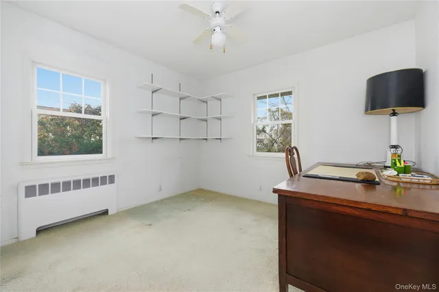 a room with furniture and window