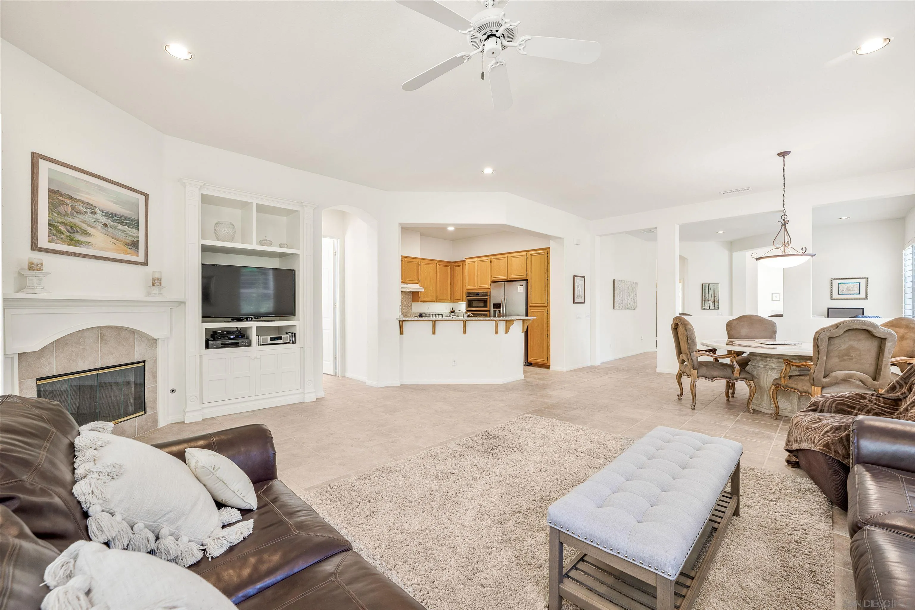 3012 Avenida Ciruela Carlsbad, CA 92009 - Photo 11 of 40 a living room with furniture and a flat screen tv