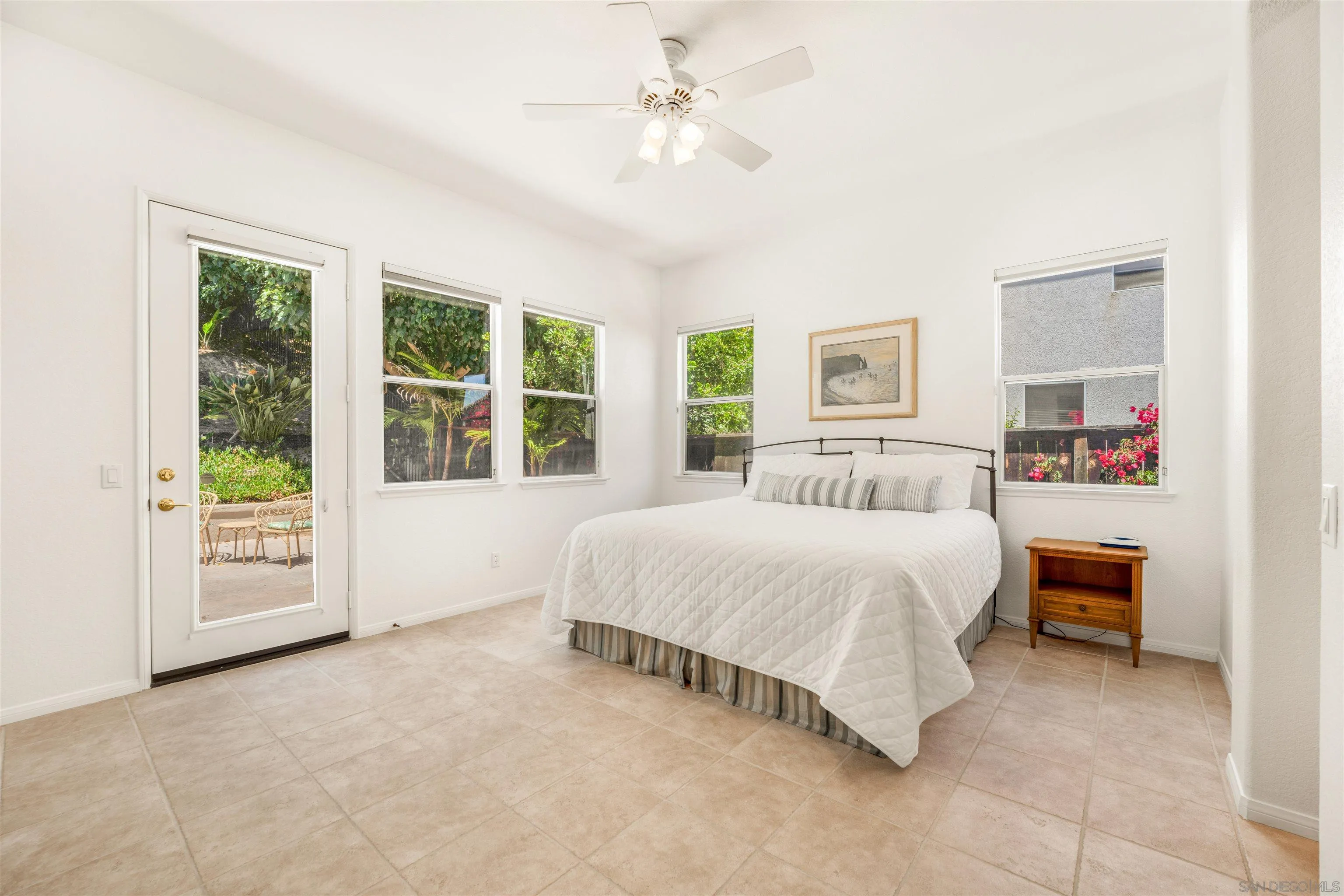 3012 Avenida Ciruela Carlsbad, CA 92009 - Photo 14 of 40 a spacious bedroom with a bed and a large window