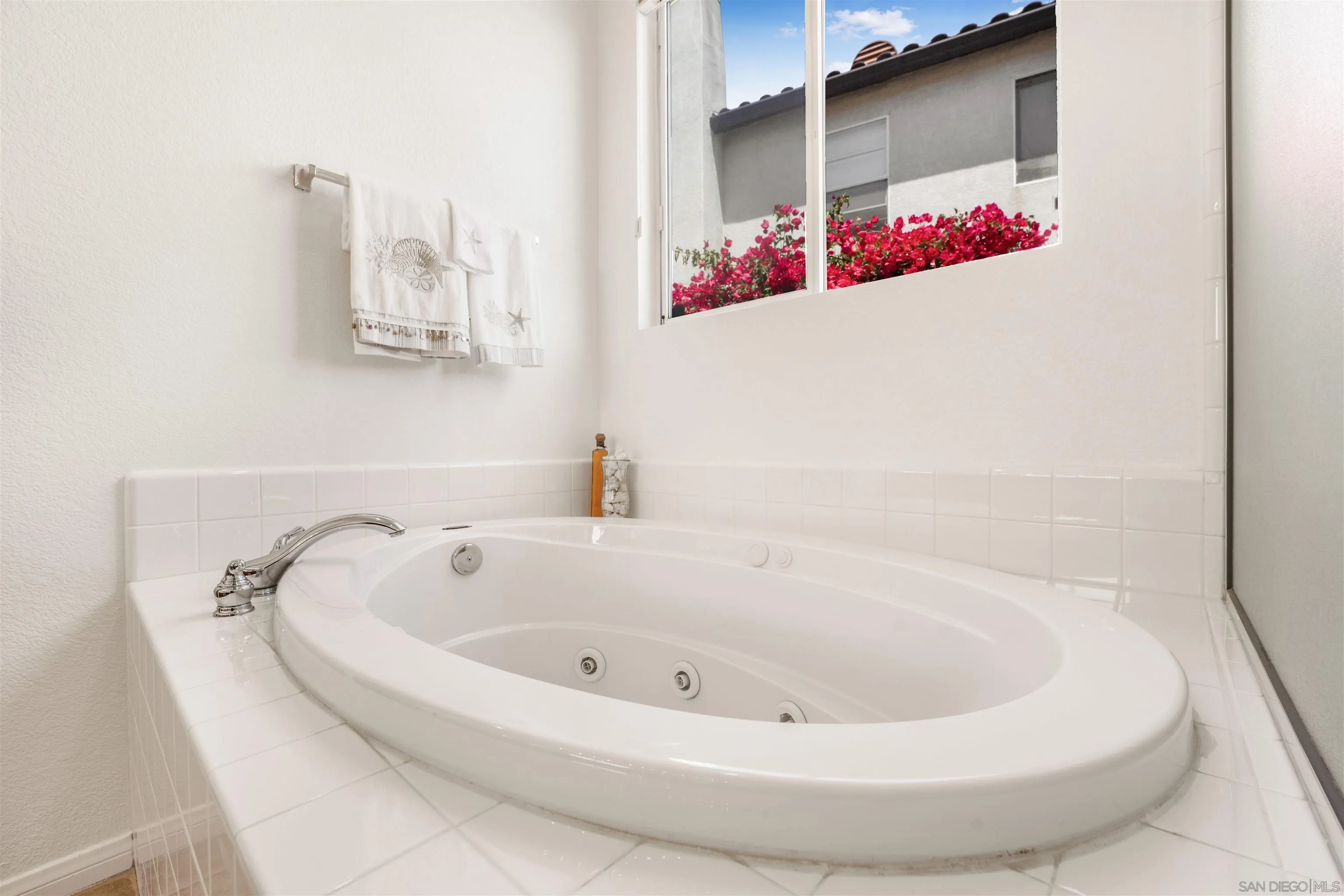 3012 Avenida Ciruela Carlsbad, CA 92009 - Photo 18 of 40 a white bath tub sitting in a bathroom