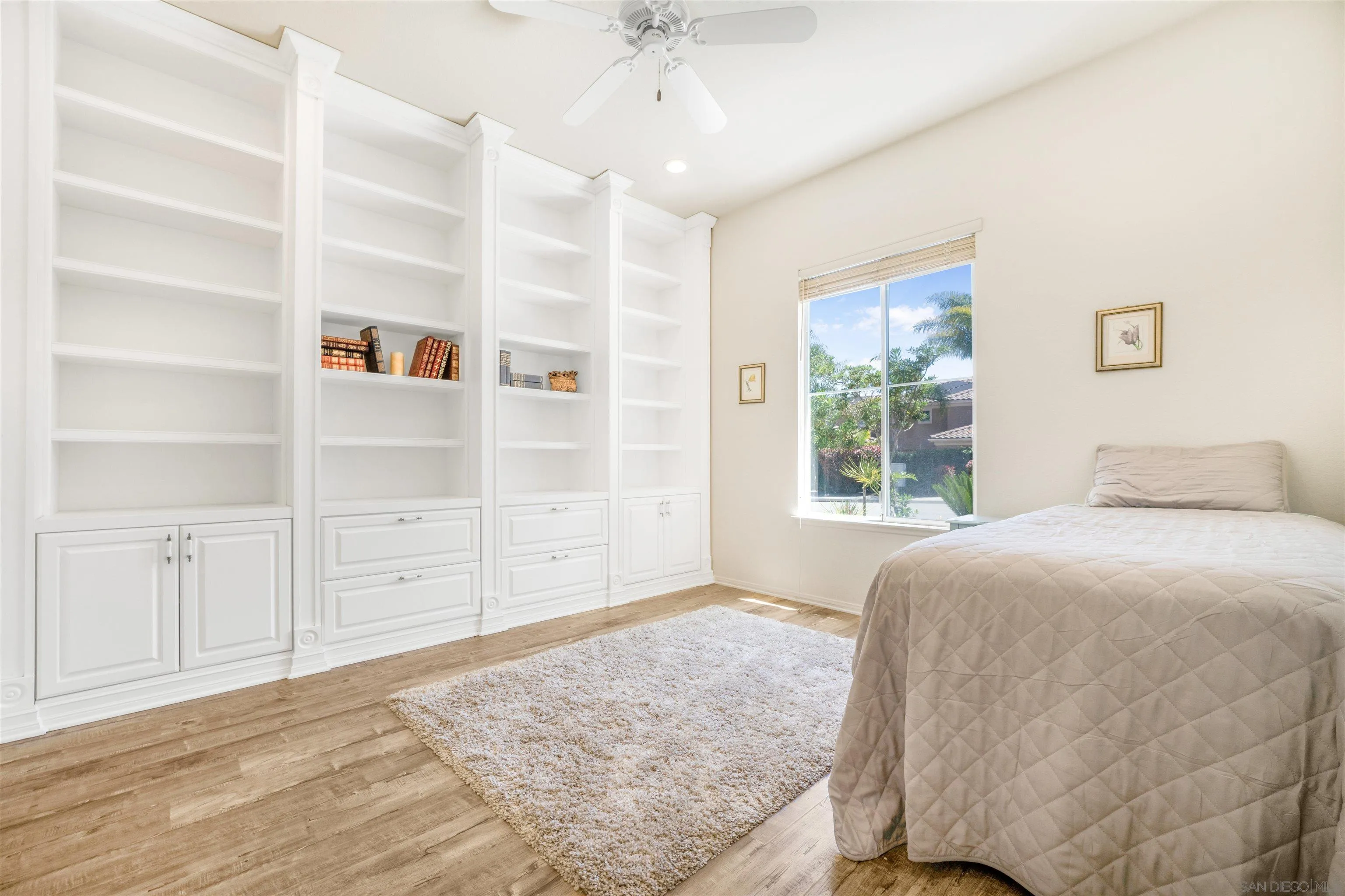 3012 Avenida Ciruela Carlsbad, CA 92009 - Photo 20 of 40 a bedroom with a bed and a window