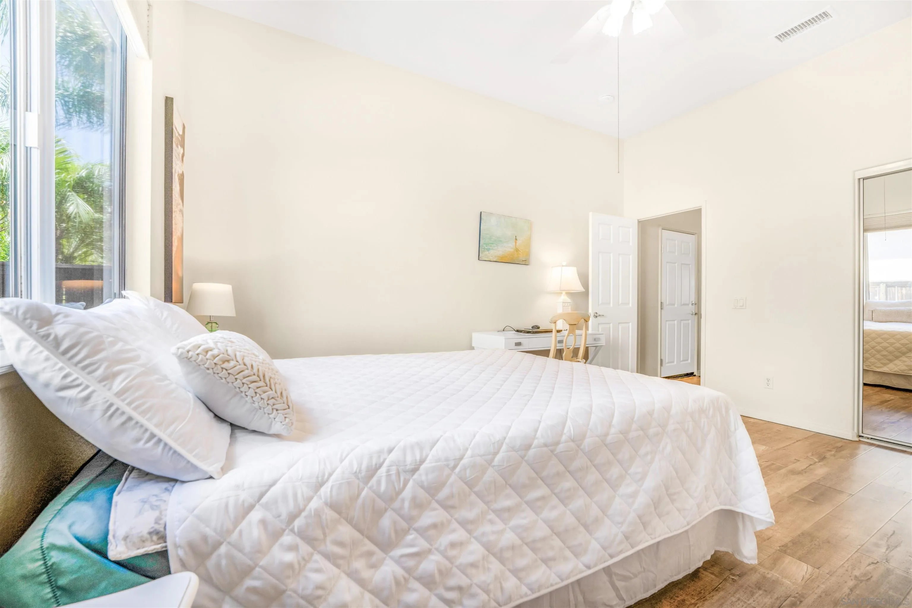 3012 Avenida Ciruela Carlsbad, CA 92009 - Photo 24 of 40 a bedroom with a bed and a night stand