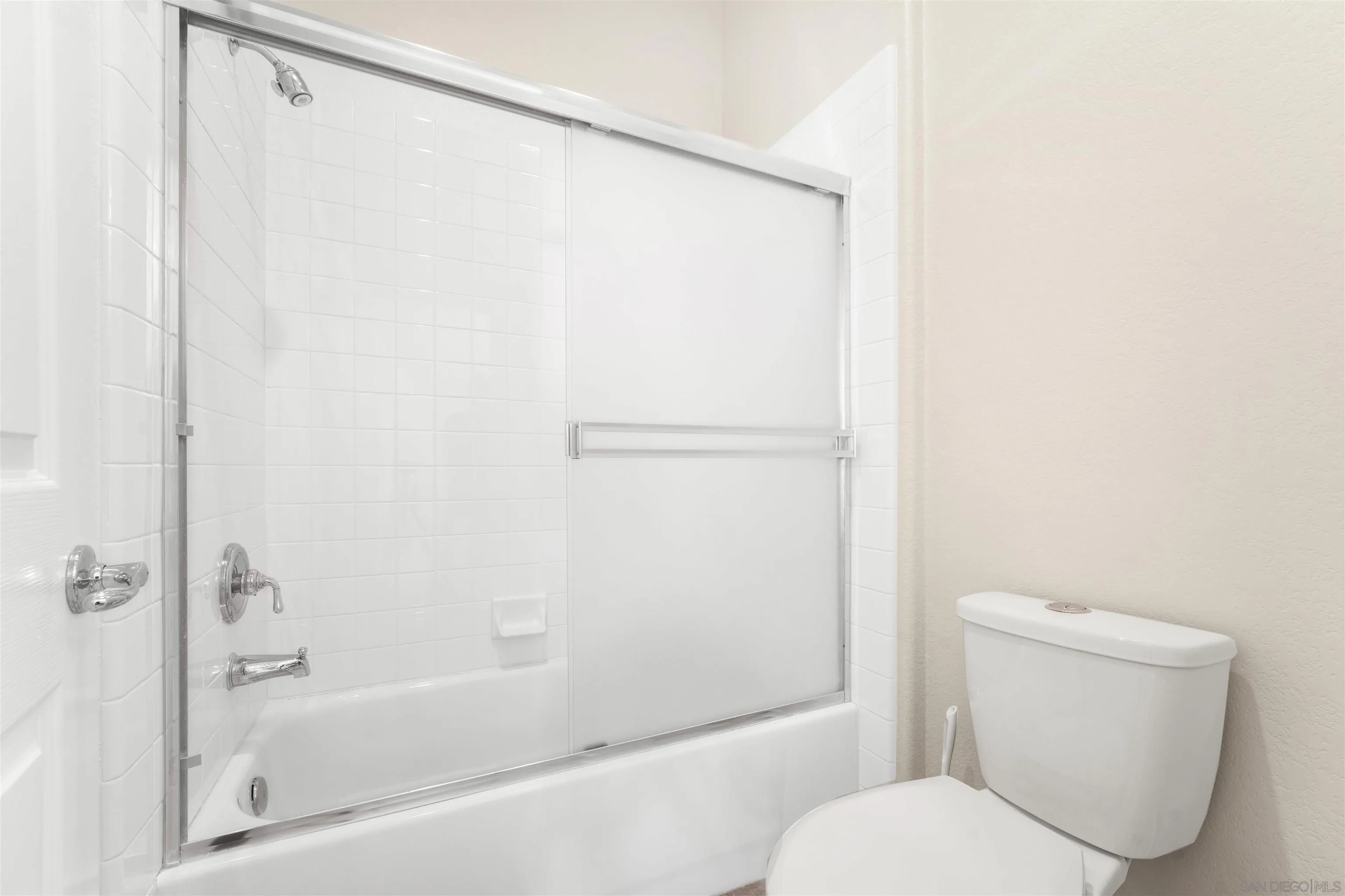 3012 Avenida Ciruela Carlsbad, CA 92009 - Photo 28 of 40 a white toilet sitting next to a bath tub