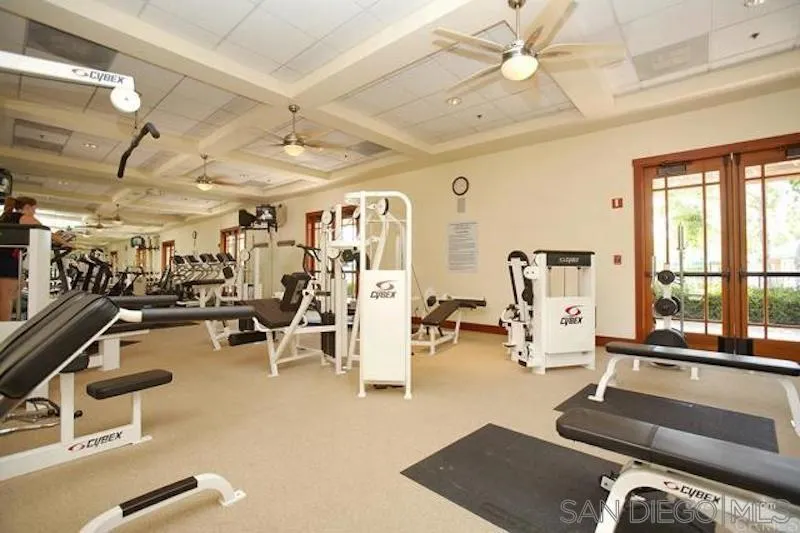 3012 Avenida Ciruela Carlsbad, CA 92009 - Photo 40 of 40 a gym room with lots of furniture and a large window