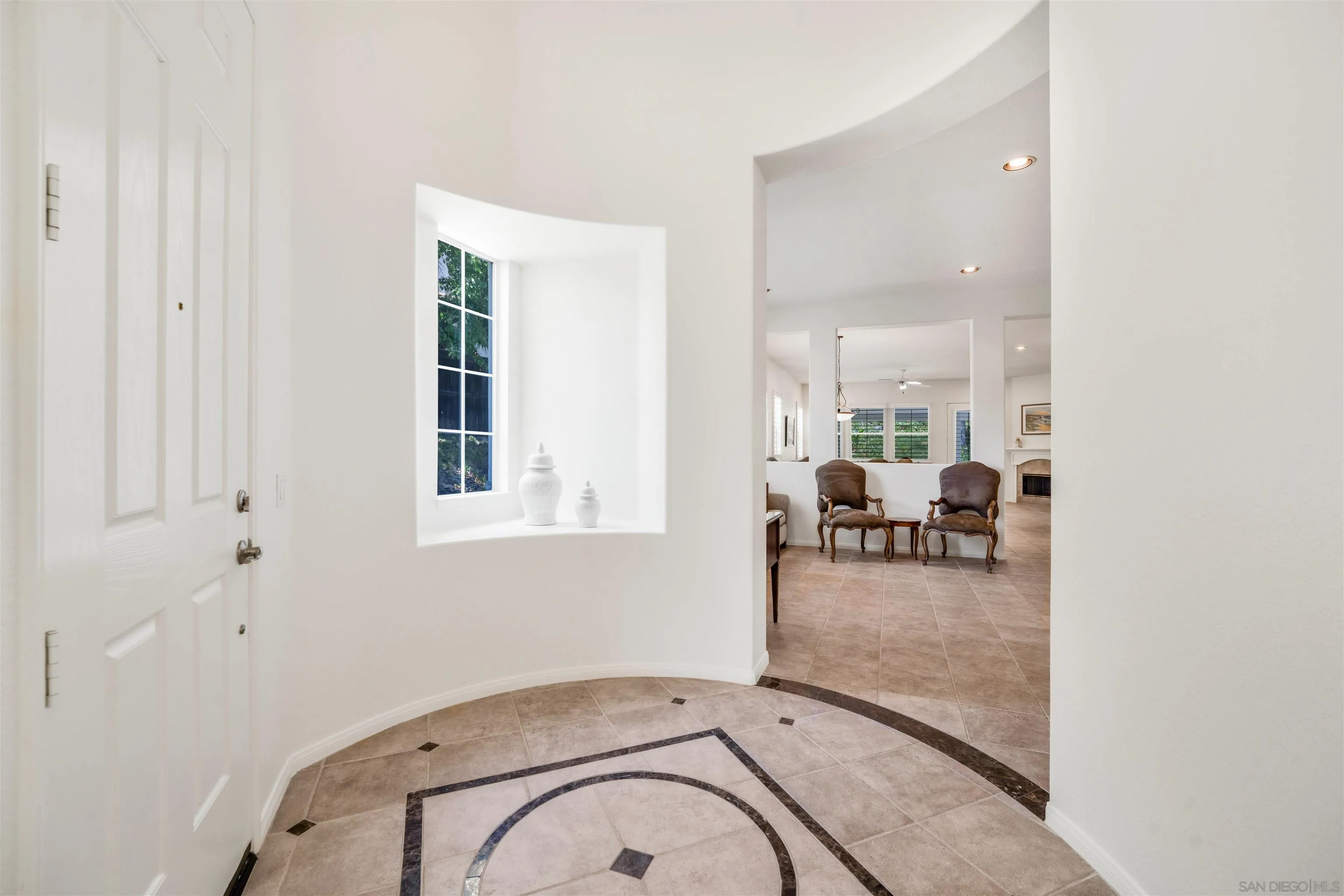 3012 Avenida Ciruela Carlsbad, CA 92009 - Photo 5 of 40 a view of a livingroom with furniture and floor to ceiling window