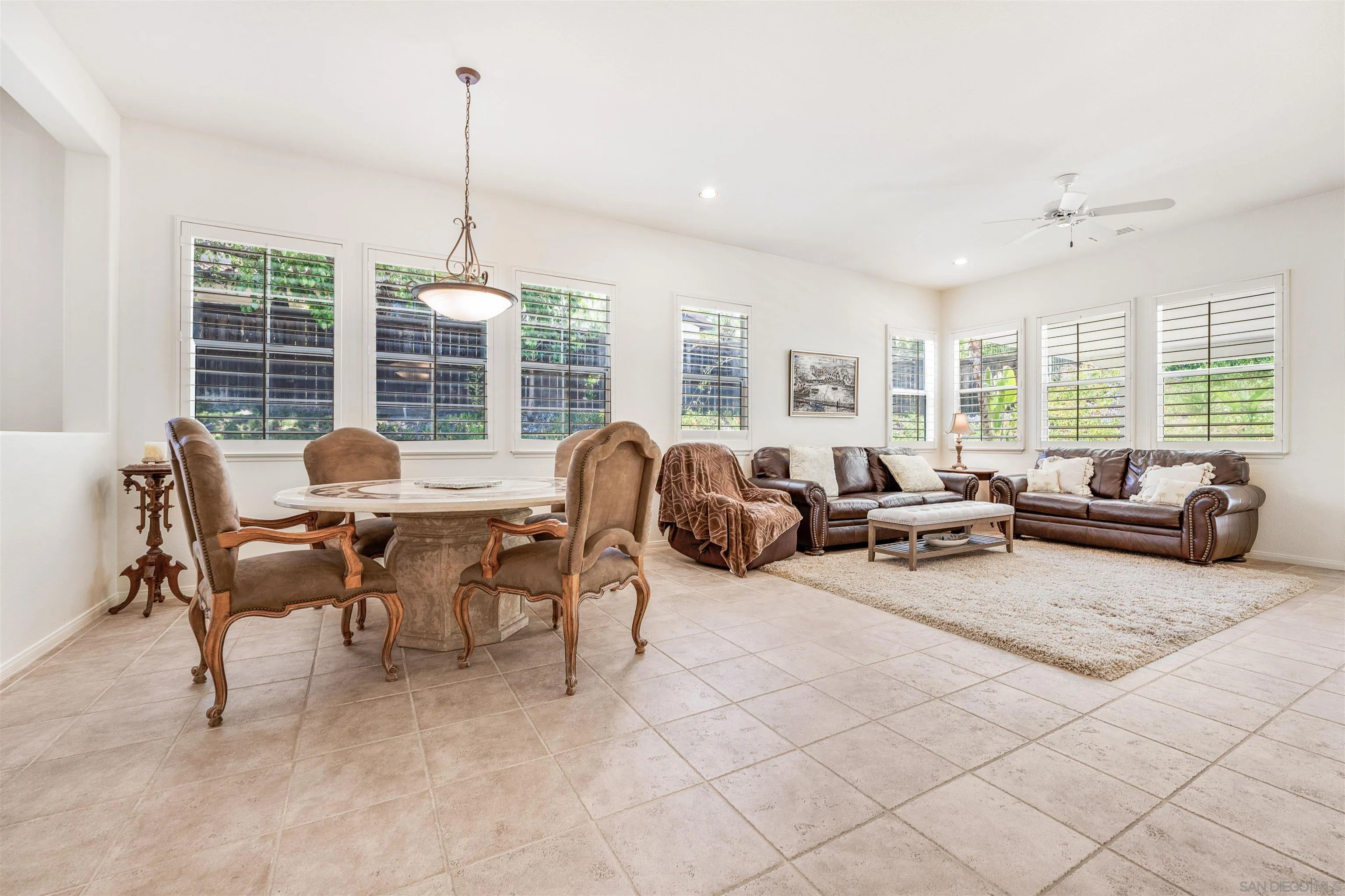 3012 Avenida Ciruela Carlsbad, CA 92009 - Photo 8 of 40 a living room with furniture and a large window