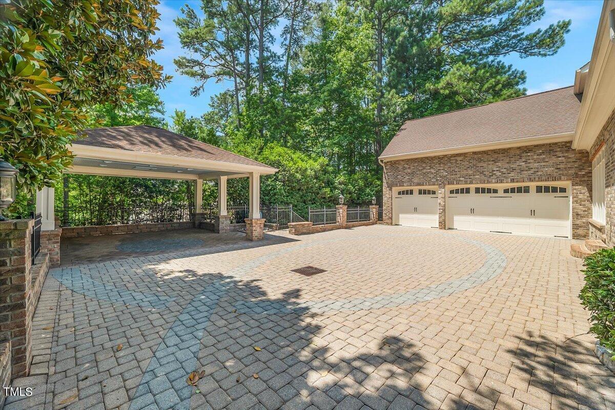 4433 Harbourgate Drive Raleigh, NC 27612 - Photo 3 of 3 a view of a house with backyard and tree