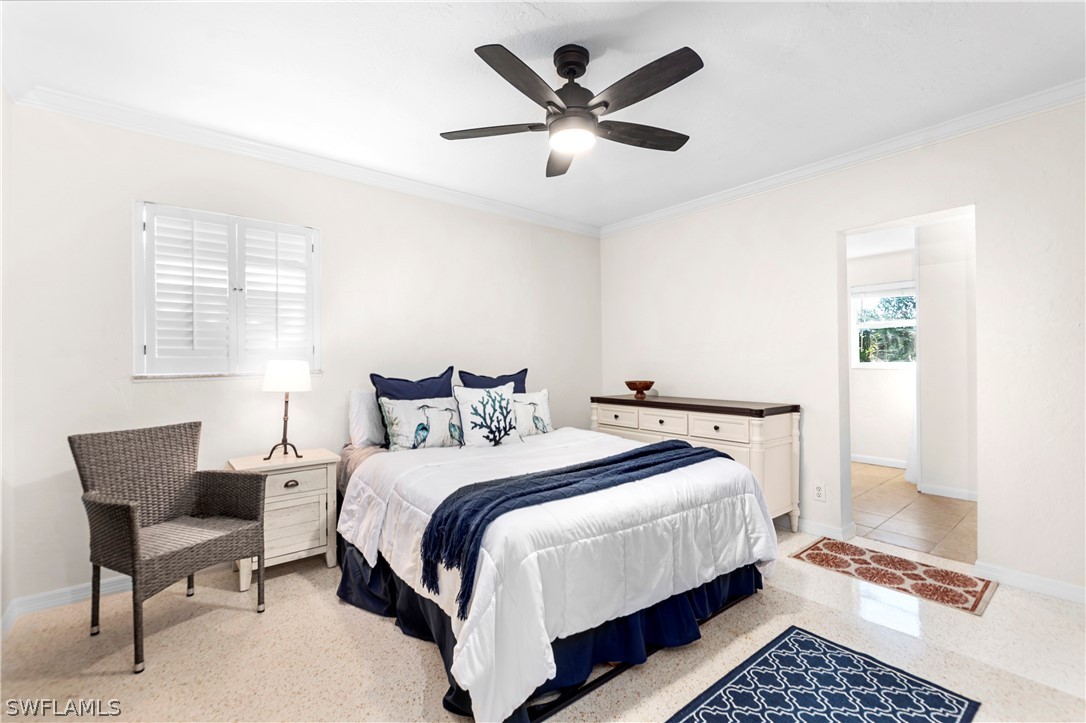 1448 Byron Road Fort Myers, FL 33919 - Photo 15 of 30 a bedroom with bed and window