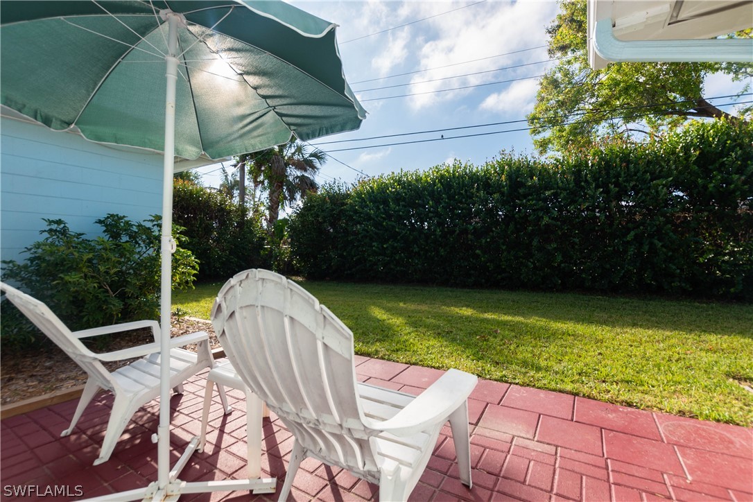 1448 Byron Road Fort Myers, FL 33919 - Photo 23 of 30 a view of a chairs and table in the patio