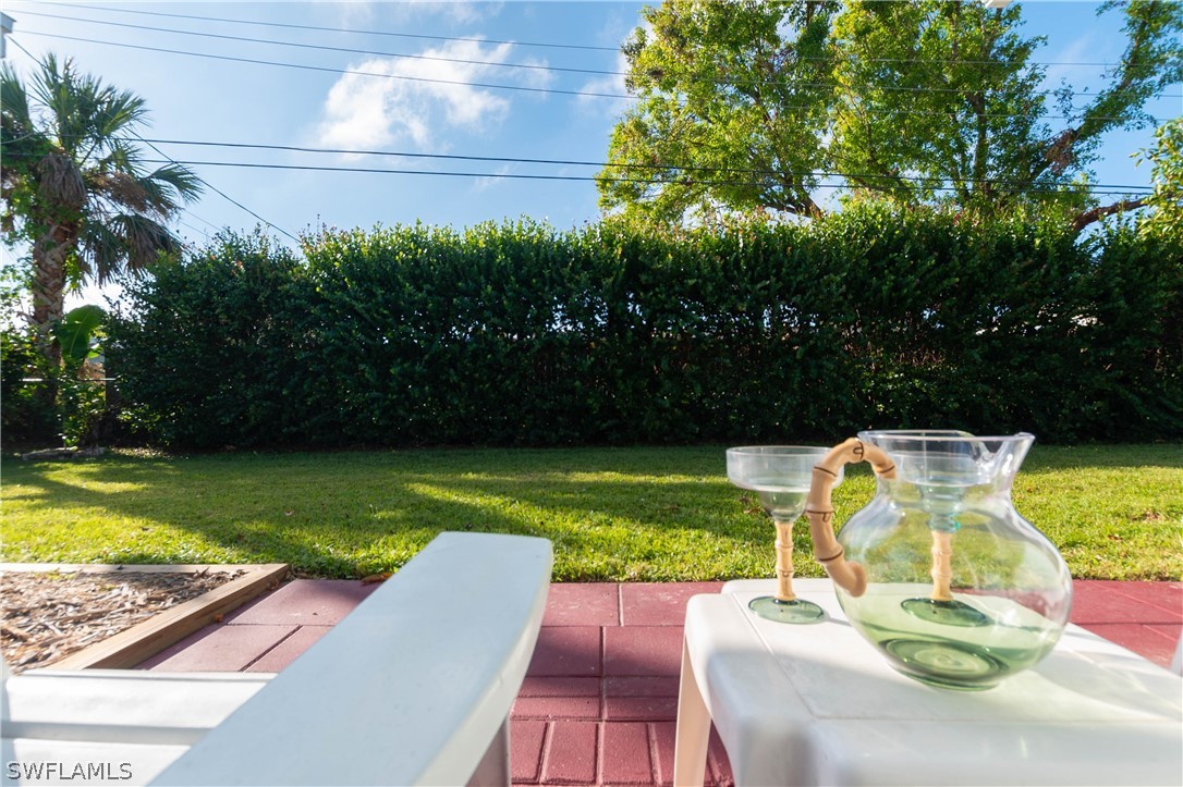 1448 Byron Road Fort Myers, FL 33919 - Photo 24 of 30 a view of a swimming pool with a patio