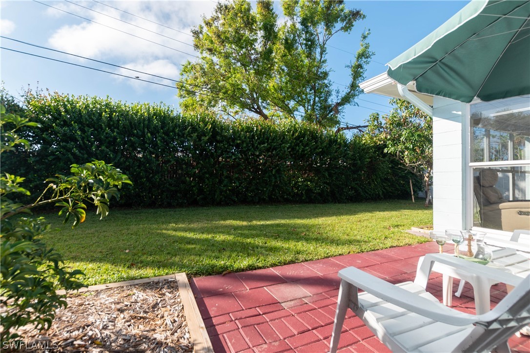 1448 Byron Road Fort Myers, FL 33919 - Photo 25 of 30 a view of a backyard with sitting area