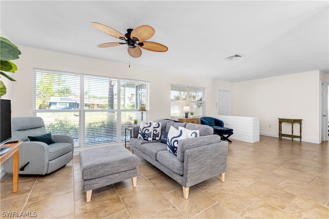 1448 Byron Road Fort Myers, FL 33919 - Photo 7 of 30 a living room with furniture and a large window