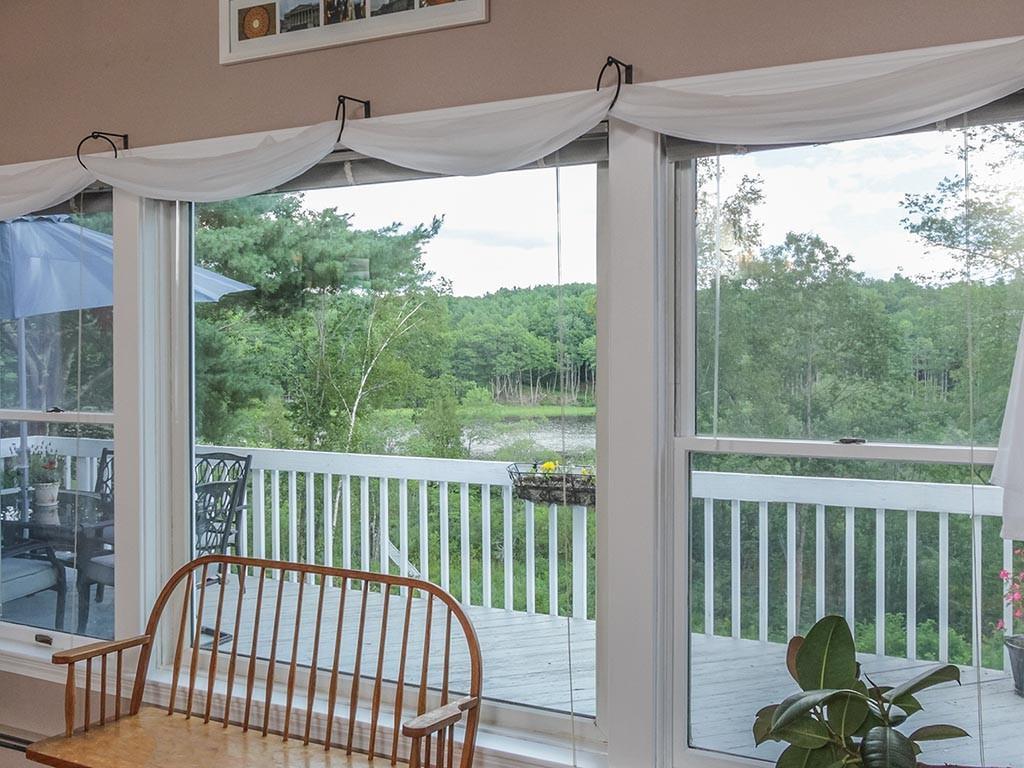107 Wallentine Road Bowdoinham, ME 04008 - Photo 9 of 35 The view of the lawn, trees and...