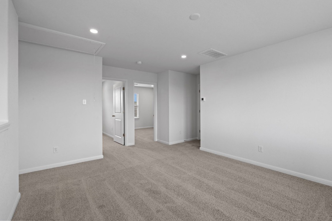 145 Hatari Trail Jarrell, TX 76537 - Photo 19 of 37 a view of an empty room