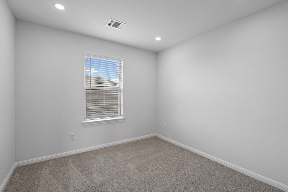 145 Hatari Trail Jarrell, TX 76537 - Photo 26 of 37 an empty room with a window