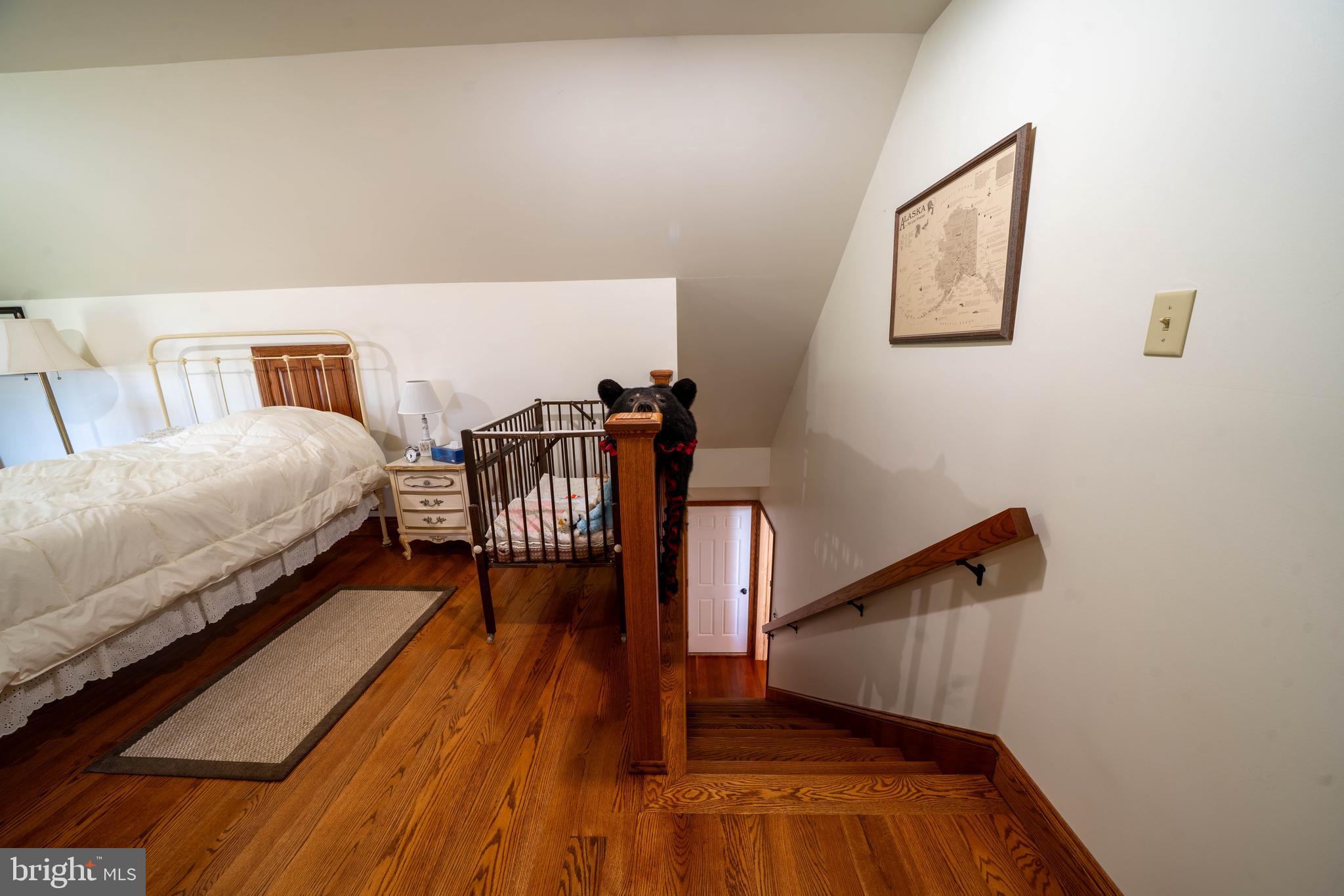 1020 Clark Hill Road Mount Pleasant Mills, PA 17853 - Photo 38 of 76 a bedroom with bed and wooden floor