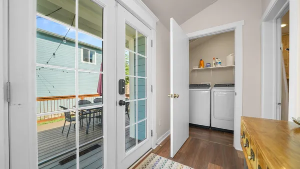 a view of a dining room with furniture window and outside view