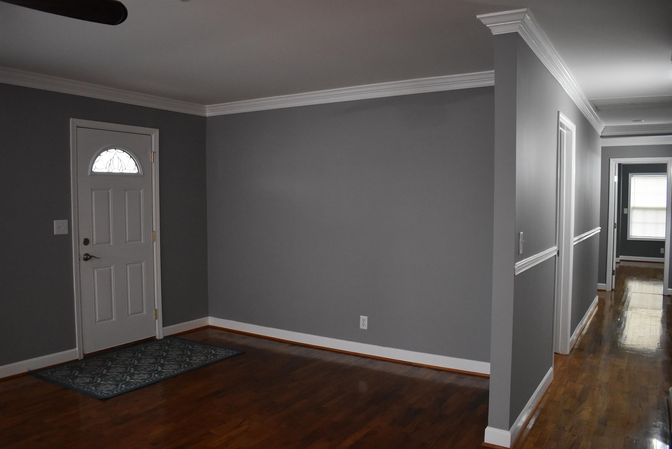 3714 Florence Road Murfreesboro, TN 37129 - Photo 7 of 25 Down this hall is a guest bath, two bedrooms with walk in closets and the master suite! Check out that crown molding! TOTAL move in ready!