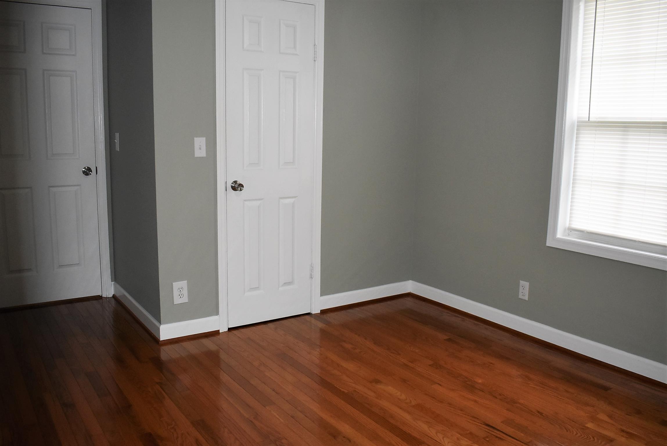 3714 Florence Road Murfreesboro, TN 37129 - Photo 10 of 25 Bedroom two with walk in closet - shelves on one side, hanging area on the other. This bedroom also has a ceiling fan.