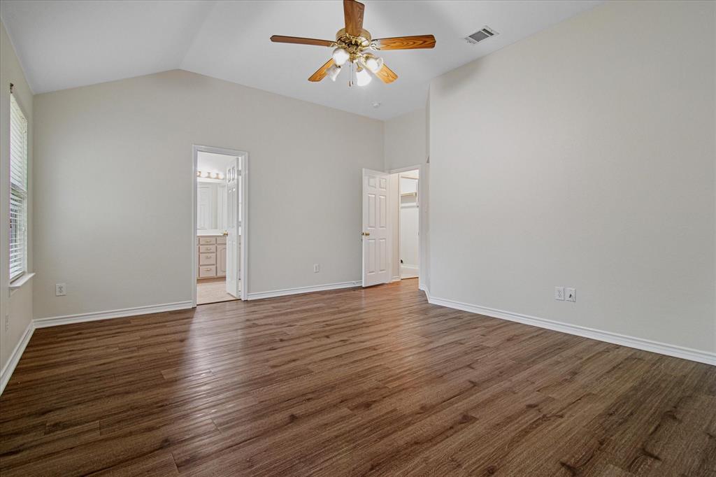 12072 Half Hitch Trail Frisco, TX 75035 - Photo 14 of 25 a view of an empty room with window and wooden floor