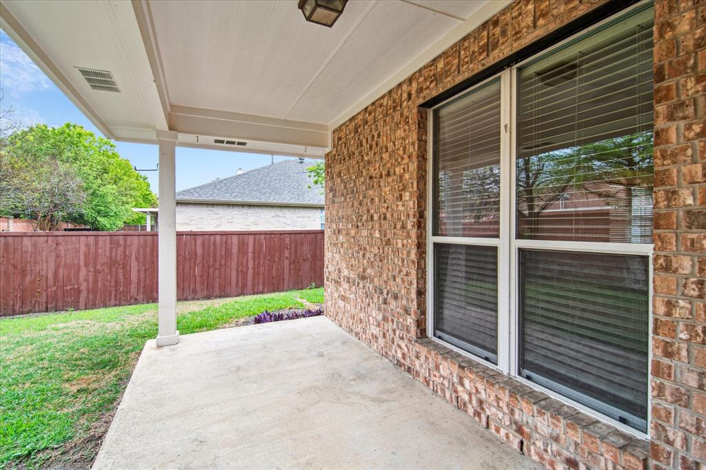 12072 Half Hitch Trail Frisco, TX 75035 - Photo 25 of 25 a view of a door with wooden fence