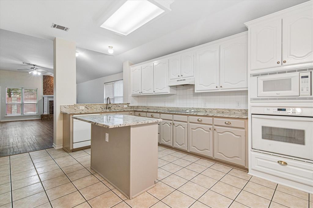 12072 Half Hitch Trail Frisco, TX 75035 - Photo 9 of 25 a kitchen with cabinets appliances and a counter top space
