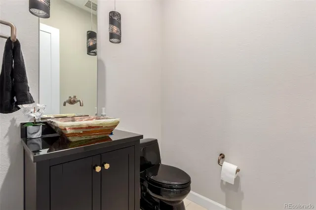 a bathroom with a sink and a toilet