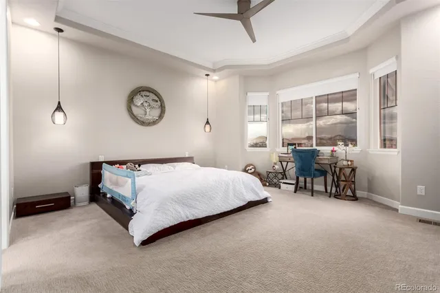 a bed room with a bed and a table