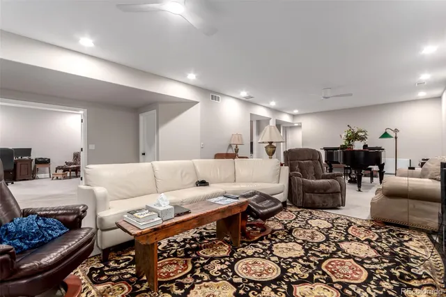 a living room with furniture and a table